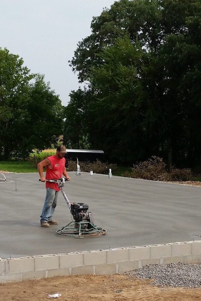 Jay Pouring a Concrete Slab