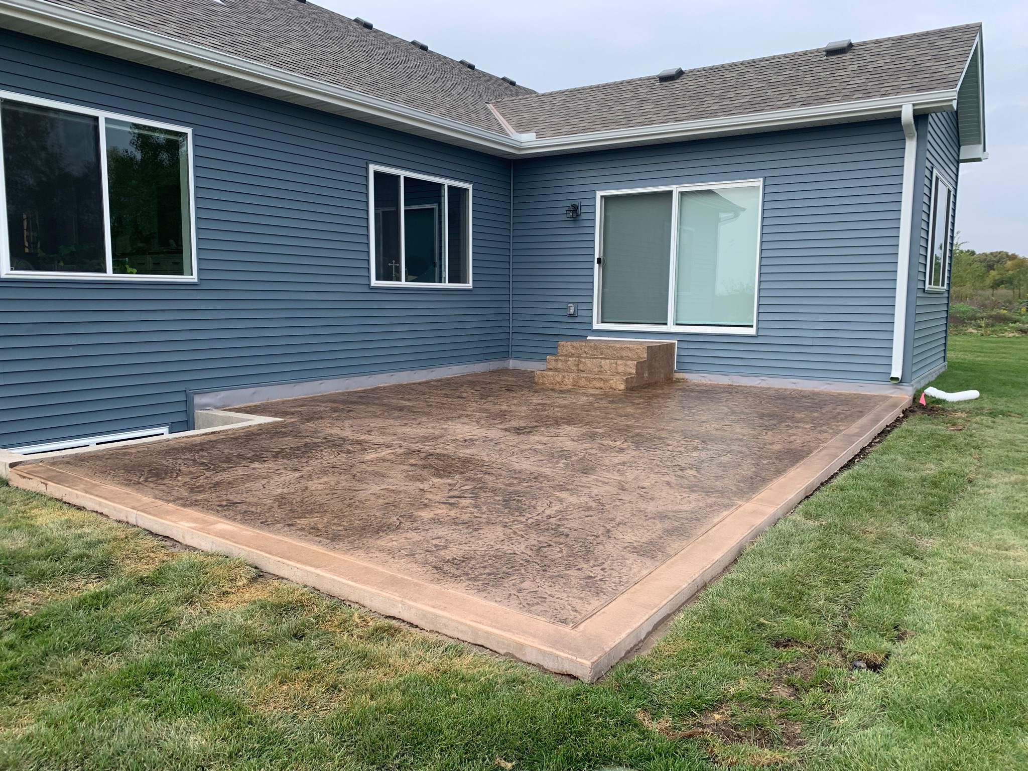 Colored and Stamped Concrete Patio and Steps